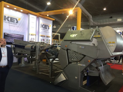 Key Technology demos its VERYX digital sorter and inspector, which is fed by Iso-Flo vibratory conveyors.