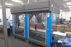 Two robots pick frozen two-packs of burgers from a conveyor and place them in cartons at 160 packs/min.
