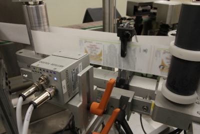 PCE label serialization kits produce serialized labels, which are inspected by a PCE smart camera.