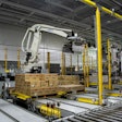 A six-axis robotic palletizer at California Dairies can handle cases of butter up to 50 lb from four packaging lines at one time.