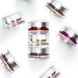 The makeup jar is customized with a click-fit functionality that allows it to attach to another jar to form a stack.
