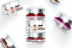 The makeup jar is customized with a click-fit functionality that allows it to attach to another jar to form a stack.