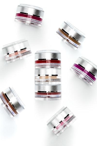 The makeup jar is customized with a click-fit functionality that allows it to attach to another jar to form a stack.