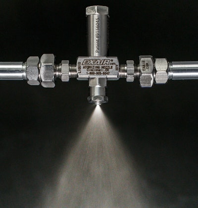 Atomizing spray nozzle