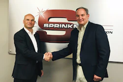 Holger Beckmann, president and CEO of Krones, Inc. and Brian Sprinkman, president of W.M. Sprinkman LLC