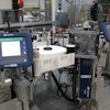 Integrated into each unwind stand of the pressure-sensitive labeler is a laser printer that receives unique serial numbers from the serialization system and prints those numbers into a 2D Data Matrix code.