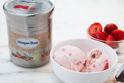 A metal container for Häagen-Dazs ice cream keeps contents frozen.