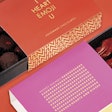 Fashion-focused U.K. consumers can purchase five different boxes of luxury truffles with cheeky one-liners such as ‘I heart emoji u.’