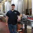 Jesse Pittman, head brewer, uses an in-line labeler to overwrap printed cans for small-batch runs requiring labels. When using h