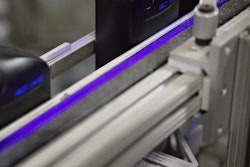Warren runs an invisible ink that is illuminated by a UV light.
