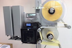 Stepper motors bring greater accuracy to this corner wrap labeler.