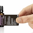 The wraparound label suits the clean and streamlined appearance of dōTERRA’s essential oil packaging.
