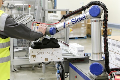 A collaborative robot palletizer accurately places the light, long, and narrow cases of tea capsules in a tight configuration.