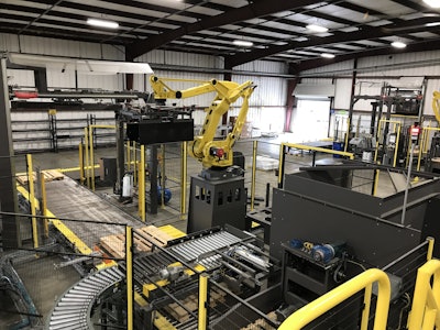 The palletizing solution uses a four-axis robot from Fanuc. At presstime, the line was idle, as it was BASF’s slow season.