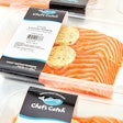 North Coast Seafoods packs its range of fresh fish filets in vacuum skin packs using thermoformed semi-rigid trays and a printed belly band for its case-ready package program.
