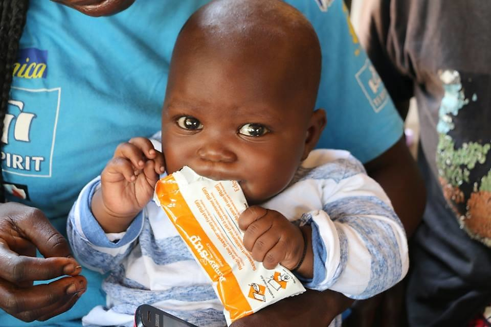 Just one box of Plumpy’Nut—containing 150 packets of a peanut-based high-energy therapeutic food that treats severe malnutrition—is enough to bring a child from the brink of death to healthy development.
