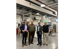 The new MIRAFLEX II at Zim’s plant in Prichard, WV. From left, Andrew Wheeler (W&H), Kevin Worthy (Zim’s), Javeed Buch (W&H), and Harry Zimmerman (Zim’s).