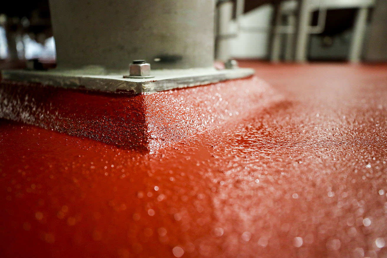 Integral cove bases at floor-to-wall transitions help to eliminate ponding water&mdash;and the resulting potential bacteria growth&mdash;at what would otherwise be 90-deg transitions in this brewery application.