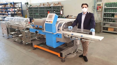 Alessandro Stiffan, Schib’s General Manager, stands with Schib flow wrapper.