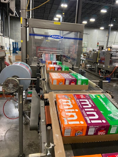 To create the multipacks, the three cartons are manually loaded into a corrugated tray and fed into the shrink wrapper/heat tunnel to be wrapped with preprinted, print-registered film.