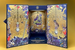 The interior illustration depicts the animals of the Royal Menagerie attending a coronation celebration surrounded by the precious Royal Regalia at the Tower of London.