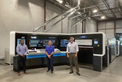 Duggal CEO and colleagues with Duggal's new Landa S10 press.