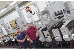 The 8-color 17” press at IMEC is the first Mark Andy Evolution to be installed in Ireland . Shown here are Production Manager James Williams (left) and Production Supervisor John Scully