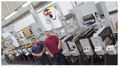 The 8-color 17” press at IMEC is the first Mark Andy Evolution to be installed in Ireland . Shown here are Production Manager James Williams (left) and Production Supervisor John Scully
