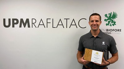 UPM Raflatac Sustainability Manager Tyler Matusevich accepts the Innovation in Responsible Sourcing Award from the Sustainable Packaging Coalition.