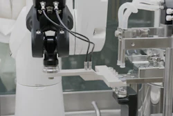 A Stäubli TX2 series Stericlean robot presents vials for secure stoppering with reliable repeatability and no risk to the aseptic environment.