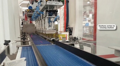 Top-loaded cartons are closed in this final robotic station.