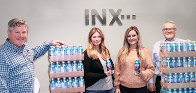 INX representatives Bryce Kristo, Michelle Pack, Dayna Campobasso and John Hrdlick ready the supply of water being shipped to Texas to help with relief efforts.