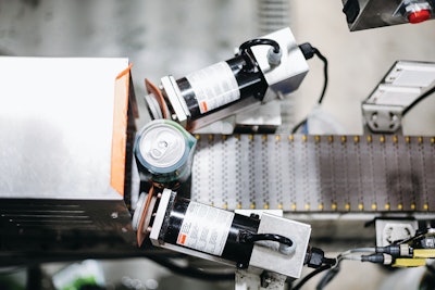 Dual banders ensure that the sleeve is in the right position when it leaves the sleever and enters the shrink tunnel. The first is set to a higher tension than the second to deal with variations in condensation or moisture on the cans.