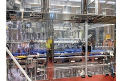 The 14-station rotary filler runs at a steady 35 bottles/min when 750-mL bottles are in production.