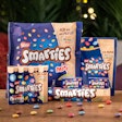 Among the new formats are a hexagonal paper tube for the Smarties Giant Tube, a multipack consisting of paper tubes held together with a label, a paper bag for small cartons of mini Smarties, and a stand-up pouch.