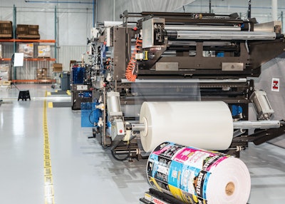 Seen here from the film infeed station is the pouch-making system operating at AccuFlex.