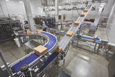 40-lb blocks of cheese are boxed and sealed, then conveyed to a palletizer in the adjoining room.