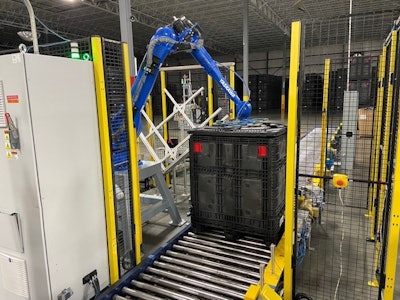 The robot places lids on the containers of preforms at a speed of 45/hr.