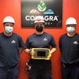 Conagra Brands’ Menomonie, Wis., team displays the ultrasonic imager that helps it identify air leaks.