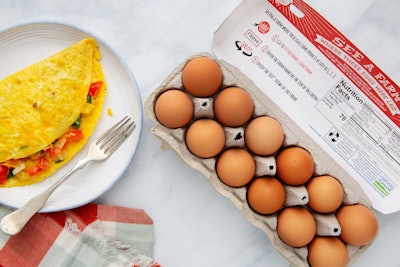 Information inside the lid advises consumers how to access 360-deg video footage of the farm where their eggs were laid.