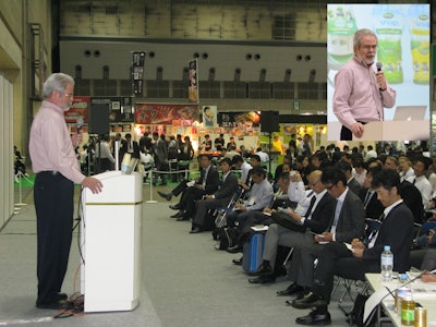 Reynolds presents at TokyoPack in 2012.