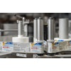 NJM’s Trotter 127 labeler can apply wraparound, front-and-back and 3-, 4- and 5-panel labels to round, square, rectangular, and oval bottles.