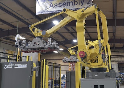 The Fanuc robot has end-of-arm tooling that uses Piab vacuum technology to pick either heavy cases or tier sheets.