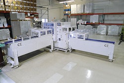 Individual units are fed into the AP-25 bander by the infeed conveyor on the left while banded breakpacks exit on the discharge conveyor on the right.