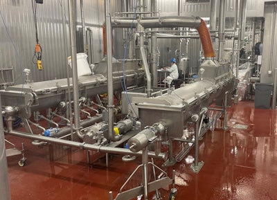 The cook room features specially sized tanks, actuated valves, and transfer pumps that select precise batches and transfer six different liquids to the respective cookers.