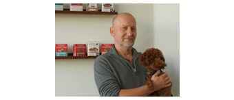 Pawel Marciniak, co-founder and President of NaturPak Pet, with family pet, Coco.