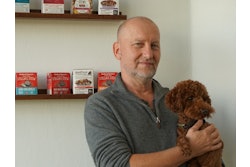 Pawel Marciniak, co-founder and President of NaturPak Pet, with family pet, Coco.