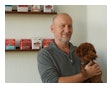 Pawel Marciniak, co-founder and President of NaturPak Pet, with family pet, Coco.