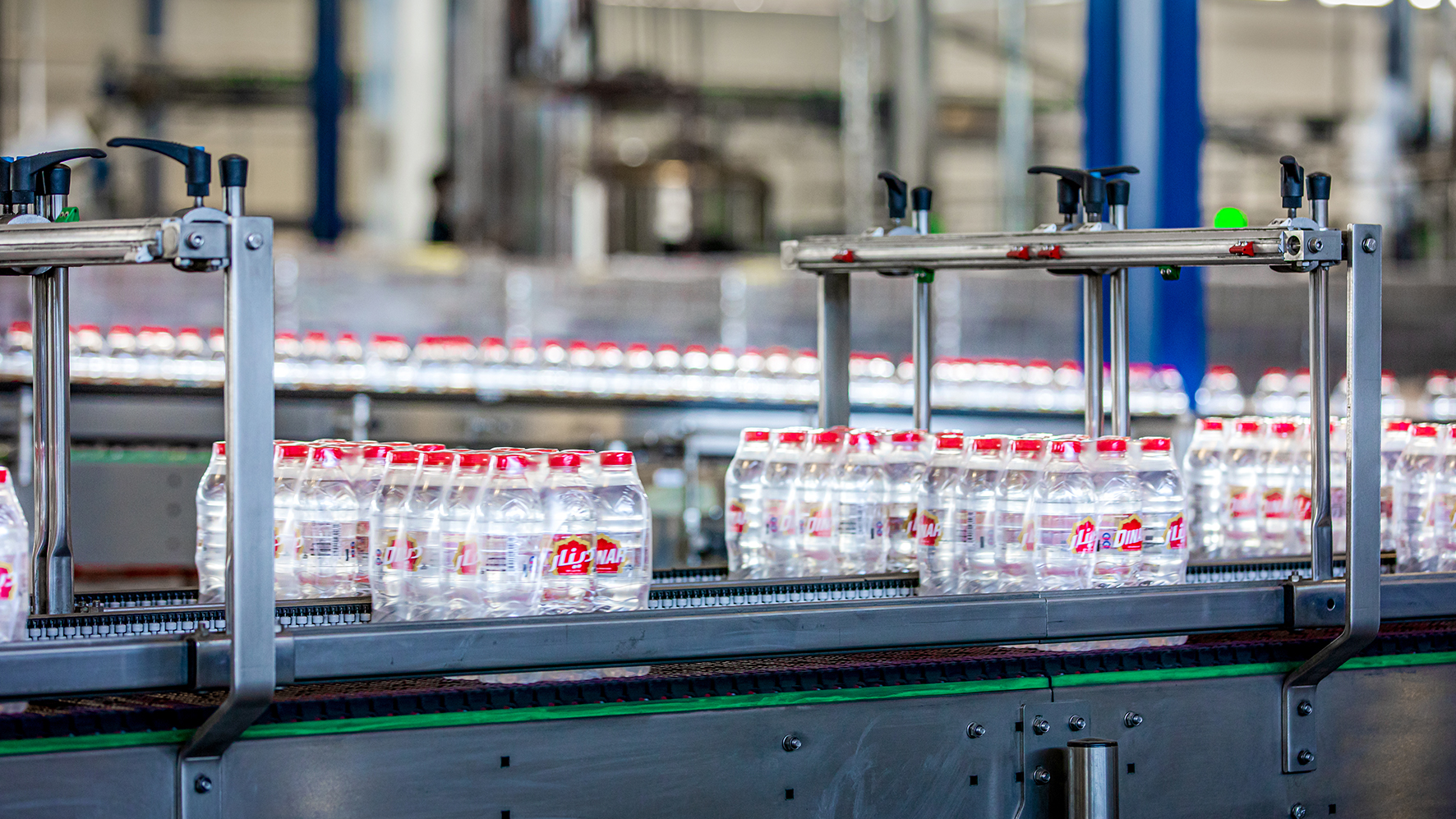 The line achieves speeds of 48,000 bottles/hour (bph).