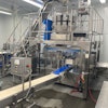 The Plan It RotoBagger inside the Hardy Buoys facility includes a multi-head weigher, the RotoBagger, a pre-made pouch machine, with a platform and sanitary washdown inclined conveyor.